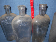 4 Vintage Clear Beverage Bottles (116)